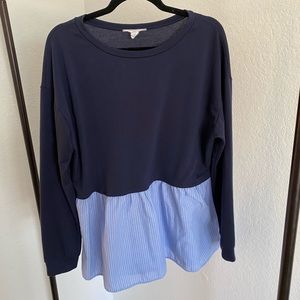 Layered sweater and blouse